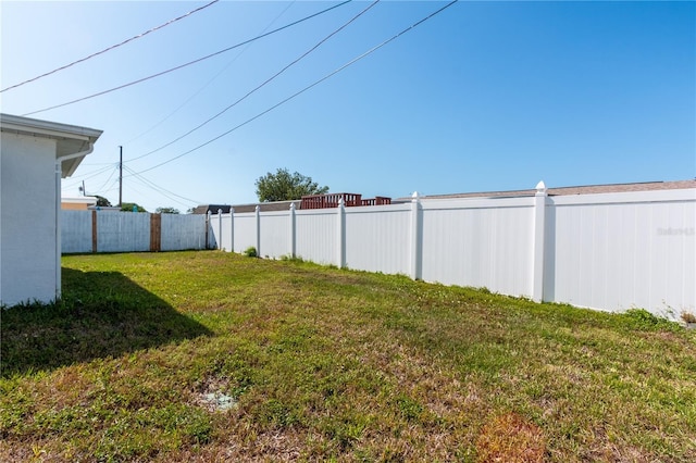 view of yard featuring fence