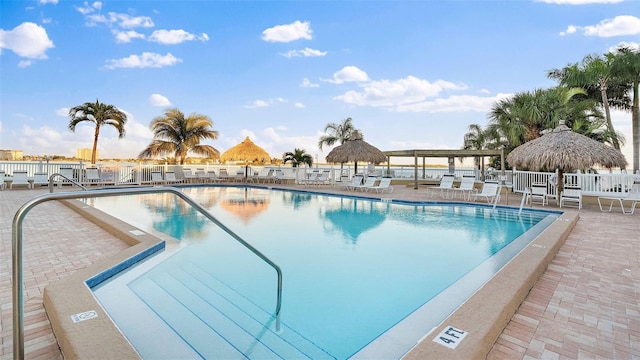 6322 Palma Del Mar Blvd S Unit 706, Saint Petersburg, FL 33715 - community pool featuring a patio area and fence