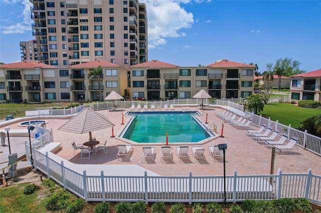 6322 Palma Del Mar Blvd S Unit 706, Saint Petersburg, FL 33715 - pool featuring fence and a patio