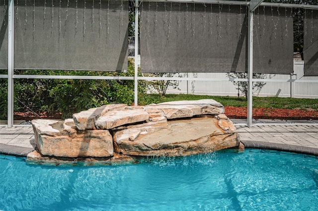 view of pool featuring a fenced in pool and a lanai