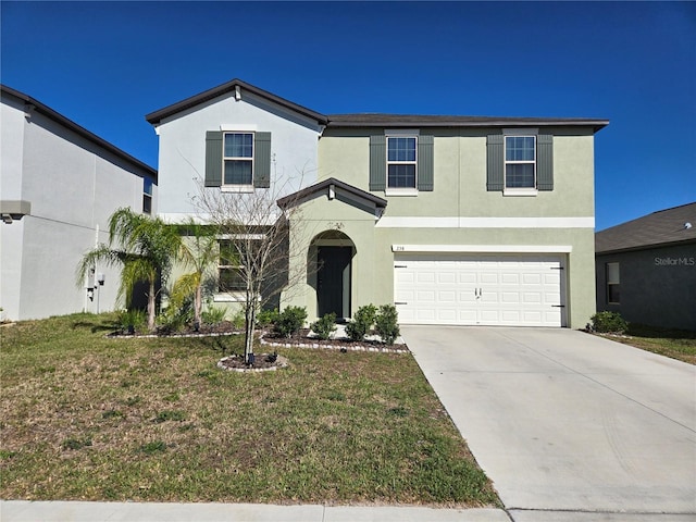 traditional-style house featuring a front lawn, stucco siding, a garage, and concrete driveway