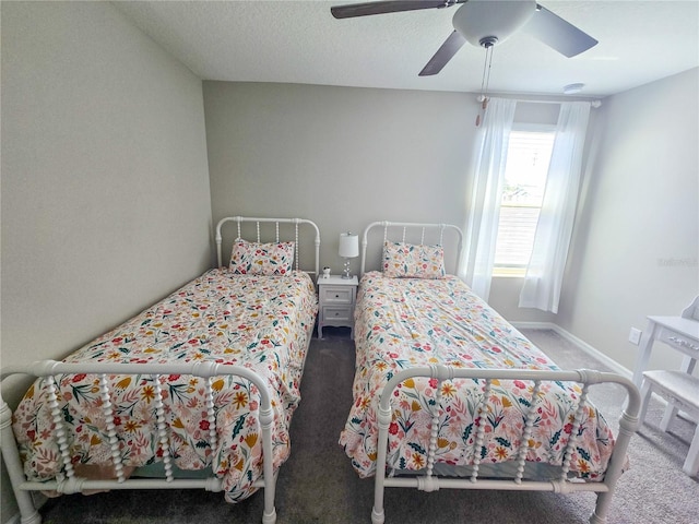 bedroom with ceiling fan and carpet floors