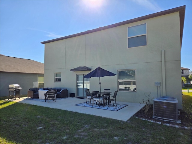 rear view of property with a patio, central air condition unit, stucco siding, an outdoor hangout area, and a lawn