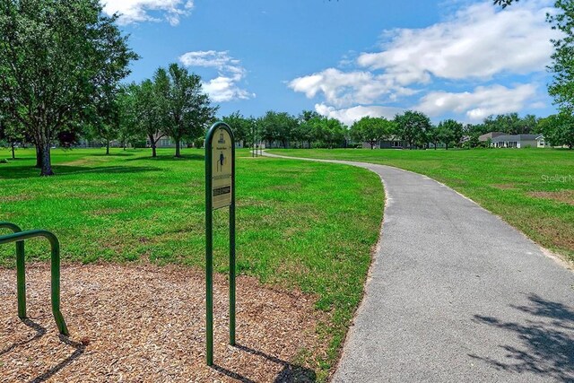 surrounding community with a lawn