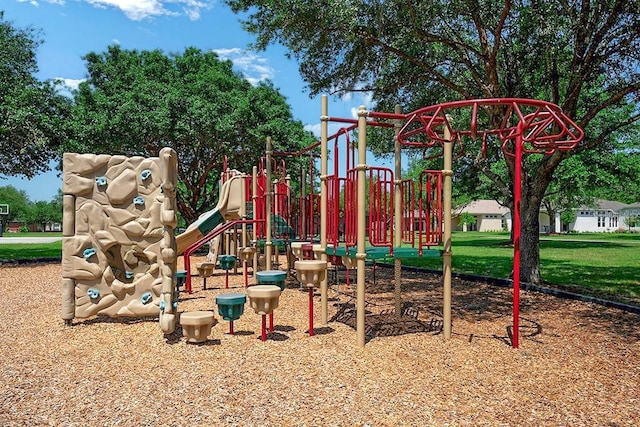 community play area with a lawn