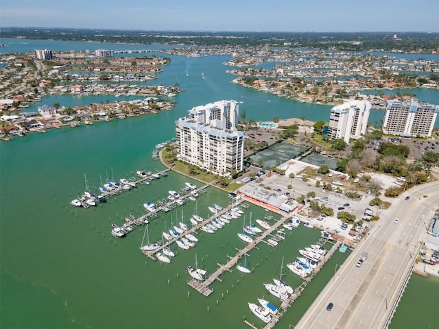 9495 Blind Pass Rd Unit 308, St Pete Beach, FL 33706 - aerial view of property and surrounding area with a large body of water, a marina, and nearby urban area