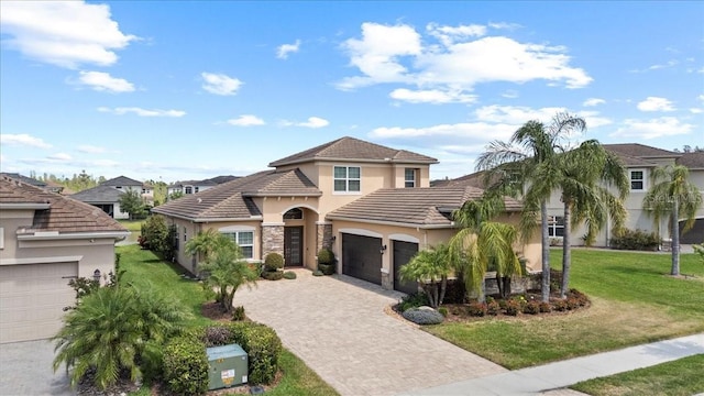 mediterranean / spanish-style house featuring a tiled roof, an attached garage, stucco siding, a front lawn, and driveway