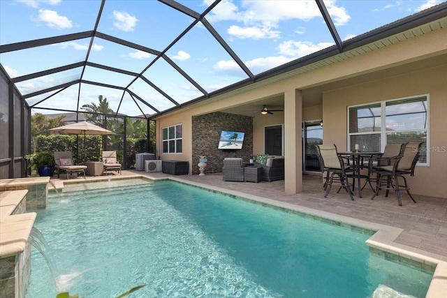 pool featuring a patio area, an outdoor living space, a ceiling fan, and a lanai