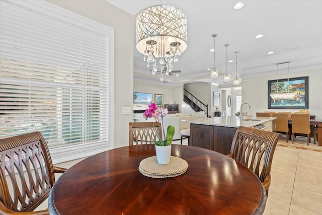 dining area featuring a notable chandelier, crown molding, stairway, recessed lighting, and light tile patterned flooring