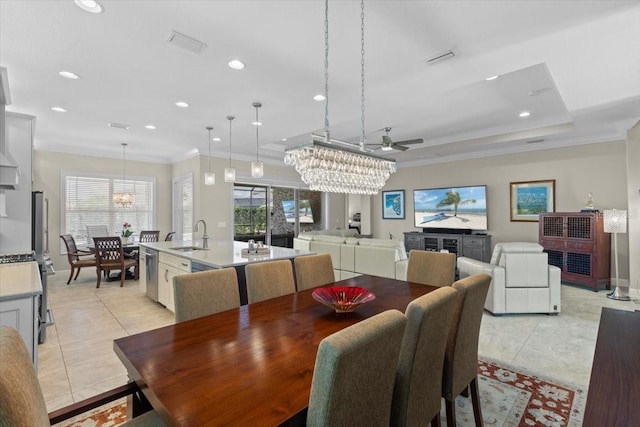 dining room featuring ornamental molding, a wealth of natural light, and light tile patterned floors