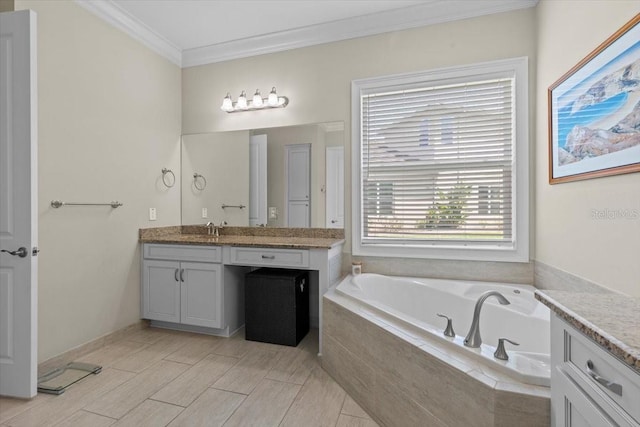 bathroom featuring vanity, a bath, and ornamental molding
