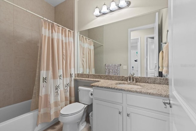full bath with shower / bathtub combination with curtain, vanity, and toilet