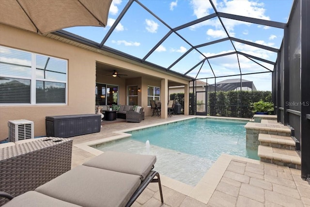 pool featuring an outdoor living space and a patio