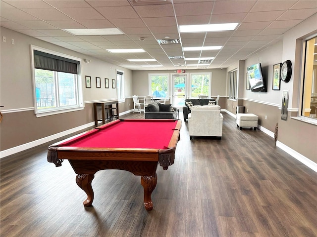 rec room featuring wood finished floors, baseboards, and visible vents