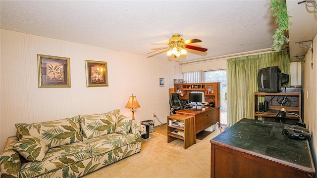 1655 S Highland Ave Unit F126, Clearwater, FL 33756 - home office featuring light colored carpet, a ceiling fan, and a textured ceiling