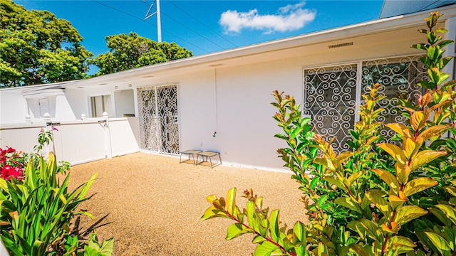 1655 S Highland Ave Unit F126, Clearwater, FL 33756 - exterior space featuring a patio area and fence