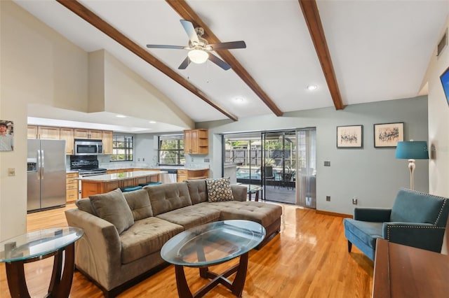 170 Foxfire Ln, Oldsmar, FL 34677 - living room featuring light wood-type flooring, vaulted ceiling with beams, baseboards, recessed lighting, and ceiling fan