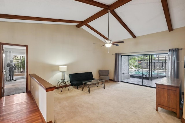 170 Foxfire Ln, Oldsmar, FL 34677 - sitting room featuring vaulted ceiling with beams, carpet floors, and ceiling fan