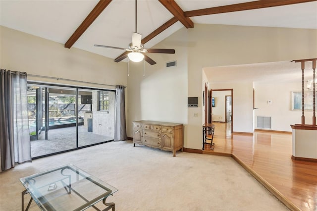 170 Foxfire Ln, Oldsmar, FL 34677 - living area with visible vents, high vaulted ceiling, ceiling fan, and beam ceiling