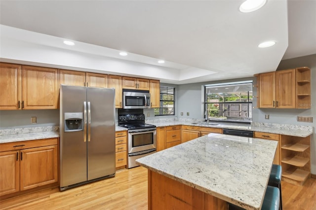 170 Foxfire Ln, Oldsmar, FL 34677 - kitchen featuring open shelves, light wood-style flooring, light stone countertops, and appliances with stainless steel finishes
