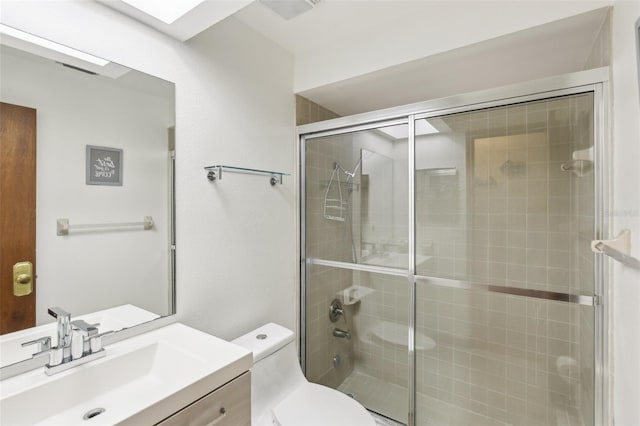 170 Foxfire Ln, Oldsmar, FL 34677 - bathroom featuring a shower stall, toilet, and vanity