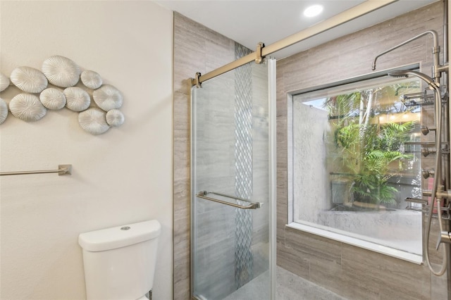 170 Foxfire Ln, Oldsmar, FL 34677 - bathroom featuring toilet and a stall shower