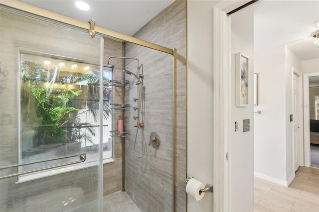 170 Foxfire Ln, Oldsmar, FL 34677 - full bathroom with a shower stall and baseboards