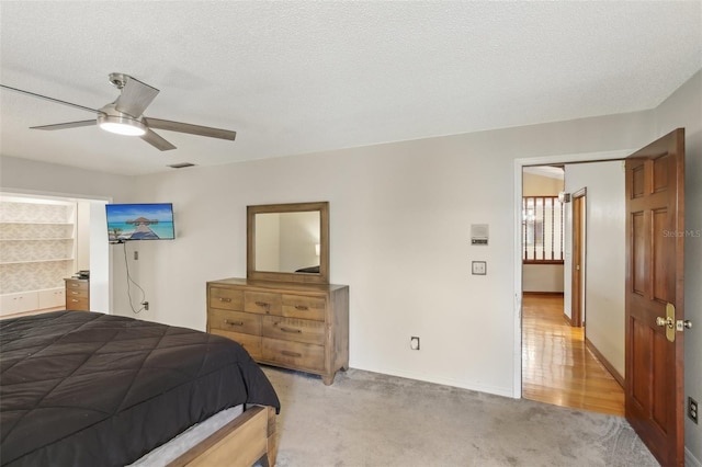 170 Foxfire Ln, Oldsmar, FL 34677 - bedroom featuring ceiling fan, light carpet, visible vents, and baseboards