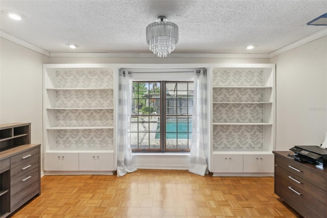 170 Foxfire Ln, Oldsmar, FL 34677 - interior space featuring recessed lighting, a textured ceiling, ornamental molding, and an inviting chandelier