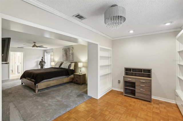 170 Foxfire Ln, Oldsmar, FL 34677 - bedroom featuring a textured ceiling, baseboards, visible vents, recessed lighting, and crown molding