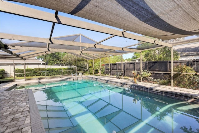 170 Foxfire Ln, Oldsmar, FL 34677 - view of pool with glass enclosure, a fenced in pool, and a fenced backyard