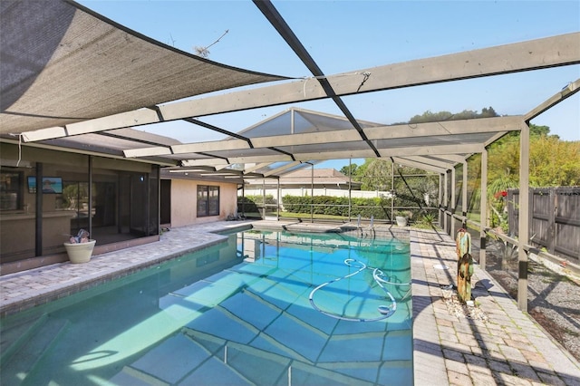 170 Foxfire Ln, Oldsmar, FL 34677 - view of pool featuring a jacuzzi, a fenced in pool, fence, glass enclosure, and a patio