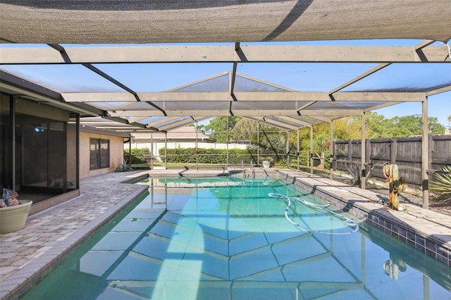 170 Foxfire Ln, Oldsmar, FL 34677 - view of swimming pool with fence, a fenced in pool, glass enclosure, and a patio