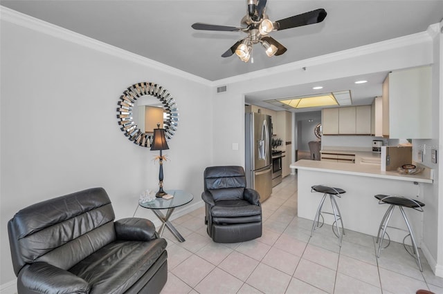 living room with baseboards, ornamental molding, a ceiling fan, recessed lighting, and light tile patterned flooring