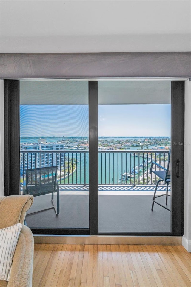 balcony featuring a water view