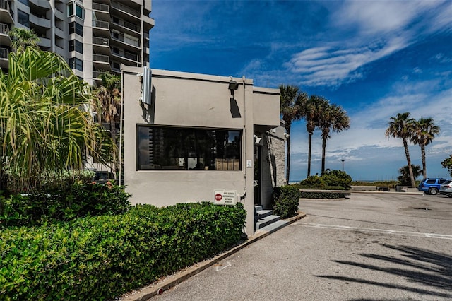 exterior space featuring stucco siding