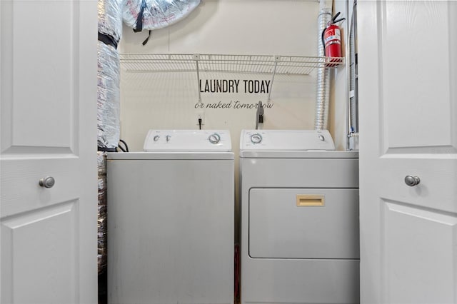 laundry area with washing machine and dryer