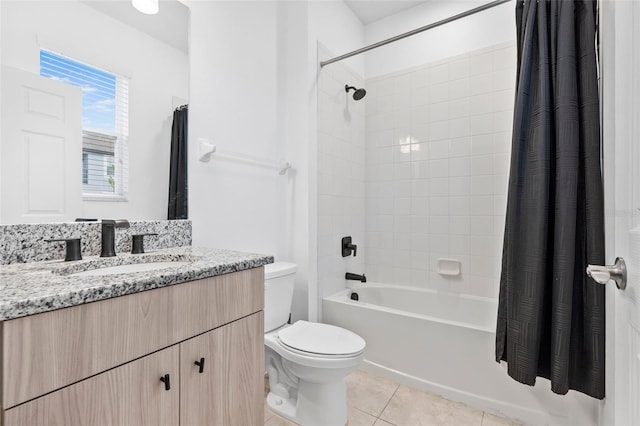 full bath with tile patterned flooring, shower / bathtub combination with curtain, vanity, and toilet