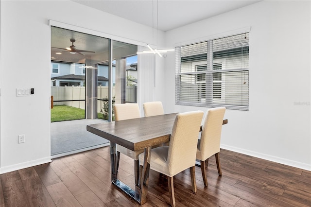 33263 Sycamore Leaf Dr, Wesley Chapel, FL 33545 - dining space featuring baseboards, wood finished floors, and ceiling fan