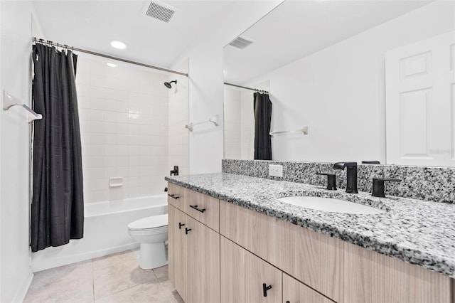 33263 Sycamore Leaf Dr, Wesley Chapel, FL 33545 - full bathroom featuring tile patterned floors, toilet, vanity, and shower / bath combo