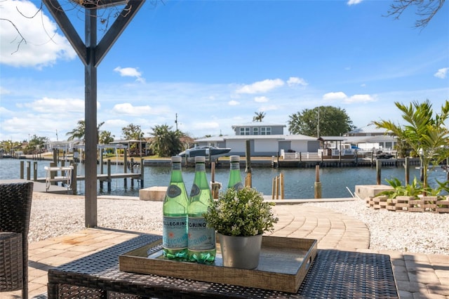 9920 Spoonbill Rd E, Bradenton, FL 34209 - dock area with a water view, boat lift, and a residential view