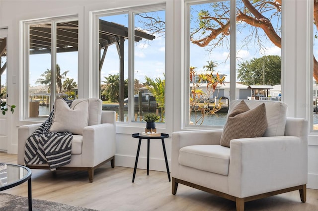 9920 Spoonbill Rd E, Bradenton, FL 34209 - sunroom / solarium featuring a water view and plenty of natural light