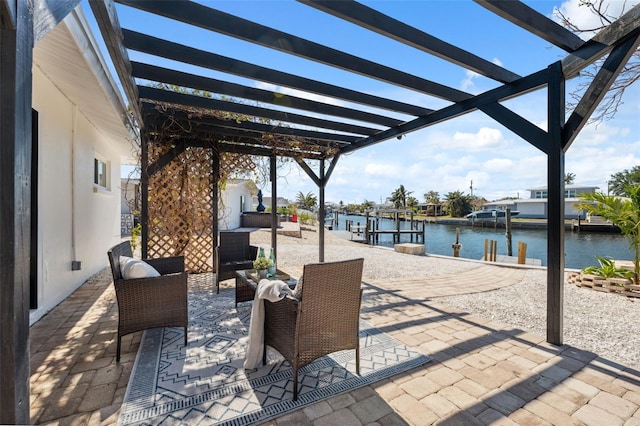 9920 Spoonbill Rd E, Bradenton, FL 34209 - view of patio featuring a pergola, a water view, and a boat dock