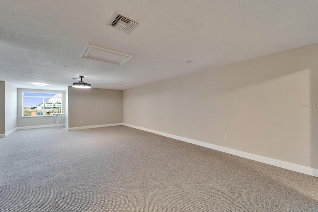 6451 Sunset Bay Cir, Apollo Beach, FL 33572 - carpeted spare room featuring visible vents, baseboards, and attic access