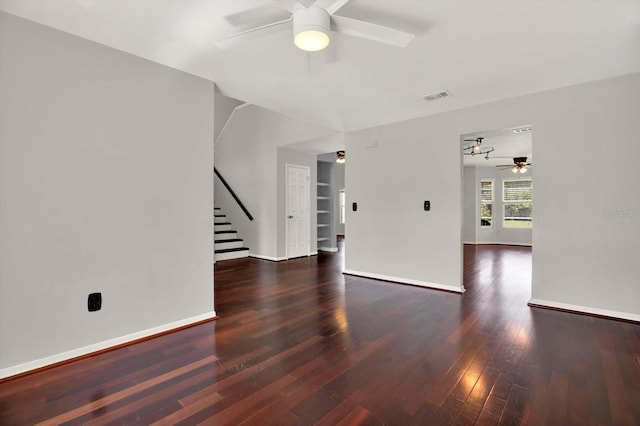 9603 Sunnyoak Dr, Riverview, FL 33569 - spare room with stairway, a ceiling fan, wood finished floors, baseboards, and visible vents