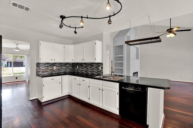 9603 Sunnyoak Dr, Riverview, FL 33569 - kitchen with dark countertops, dishwasher, ceiling fan, and a peninsula