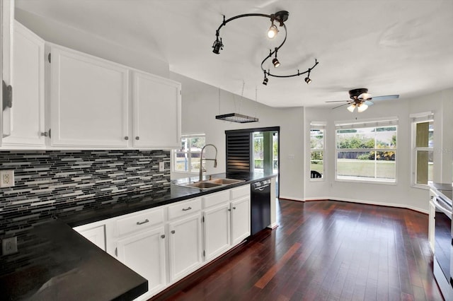9603 Sunnyoak Dr, Riverview, FL 33569 - kitchen featuring dark countertops, a ceiling fan, a sink, black dishwasher, and white cabinetry