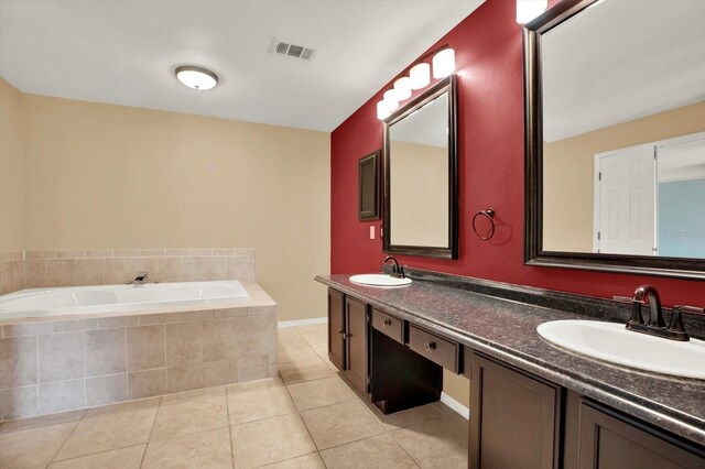 9603 Sunnyoak Dr, Riverview, FL 33569 - bathroom featuring a bath, tile patterned floors, a sink, and visible vents