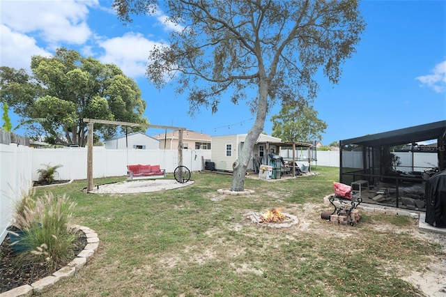 13416 Algoma Ave, Spring Hill, FL 34609 - view of yard featuring an outdoor fire pit and a patio area