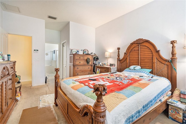 6130 Whimbrelwood Dr, Lithia, FL 33547 - bedroom with light colored carpet and ensuite bathroom